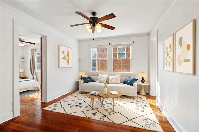 2615 S Carrollton Ave Unit D, New Orleans, LA 70118 - living area featuring a ceiling fan, wood finished floors, crown molding, and baseboards