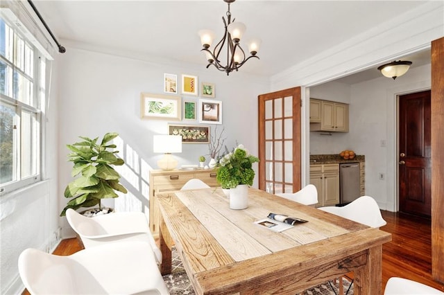 2615 S Carrollton Ave Unit D, New Orleans, LA 70118 - dining room with a chandelier and wood finished floors