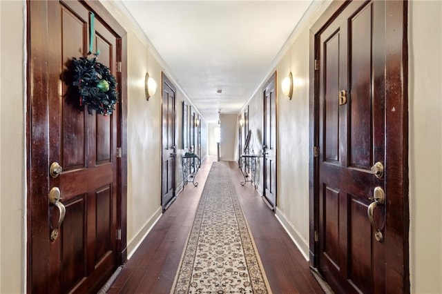 2615 S Carrollton Ave Unit D, New Orleans, LA 70118 - hallway featuring baseboards, dark wood-type flooring, and ornamental molding