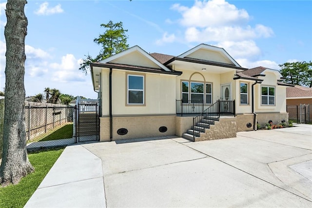 2925 Barataria Blvd, Marrero, LA 70072 - ranch-style home with a gate and stucco siding