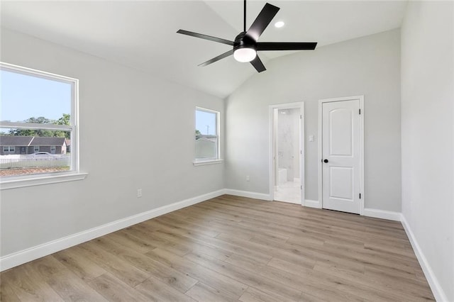 2925 Barataria Blvd, Marrero, LA 70072 - unfurnished bedroom featuring vaulted ceiling, light wood finished floors, baseboards, ensuite bathroom, and ceiling fan