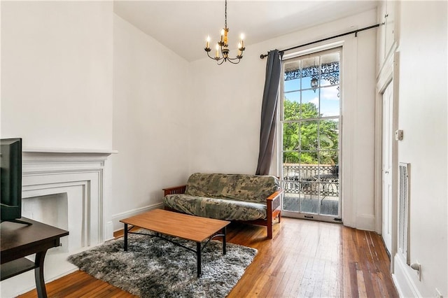835 Saint Louis St Unit F, New Orleans, LA 70112 - sitting room with a chandelier and wood-type flooring