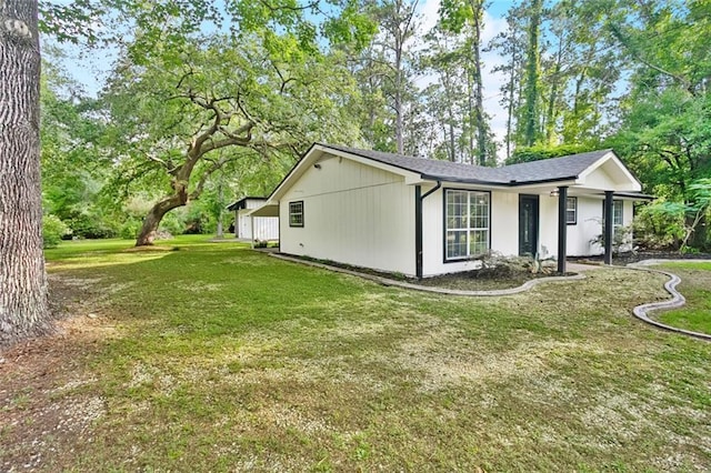 112 Oakwood Dr, Slidell, LA 70460 - view of side of home with a yard