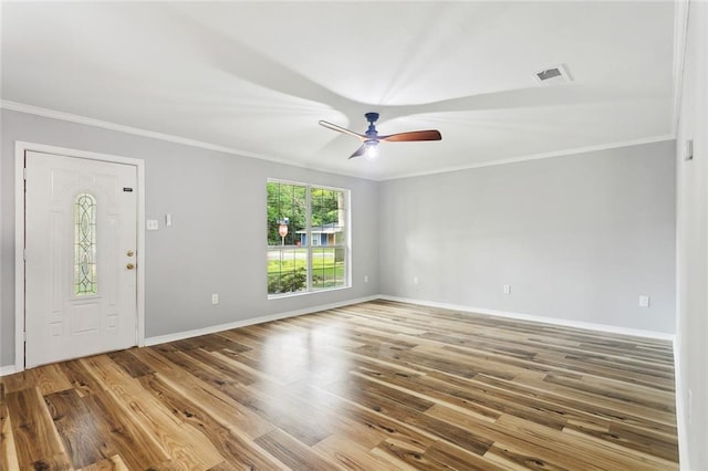 112 Oakwood Dr, Slidell, LA 70460 - foyer entrance with ornamental molding, a ceiling fan, baseboards, and wood finished floors