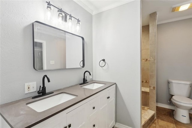 112 Oakwood Dr, Slidell, LA 70460 - full bathroom featuring toilet, crown molding, double vanity, tiled shower, and tile patterned flooring