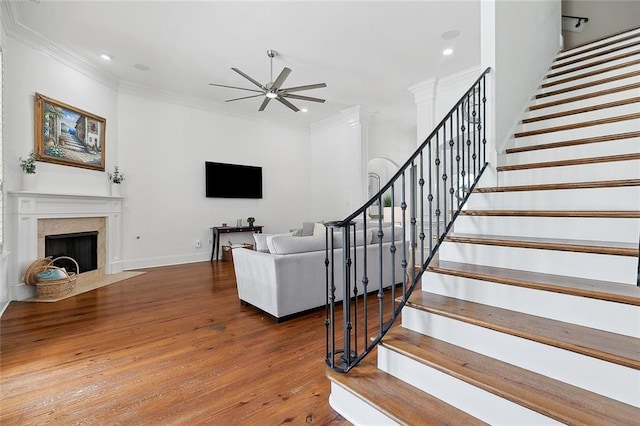 126 Tchefuncta Dr S, Covington, LA 70433 - living room with a ceiling fan, stairway, crown molding, wood finished floors, and recessed lighting