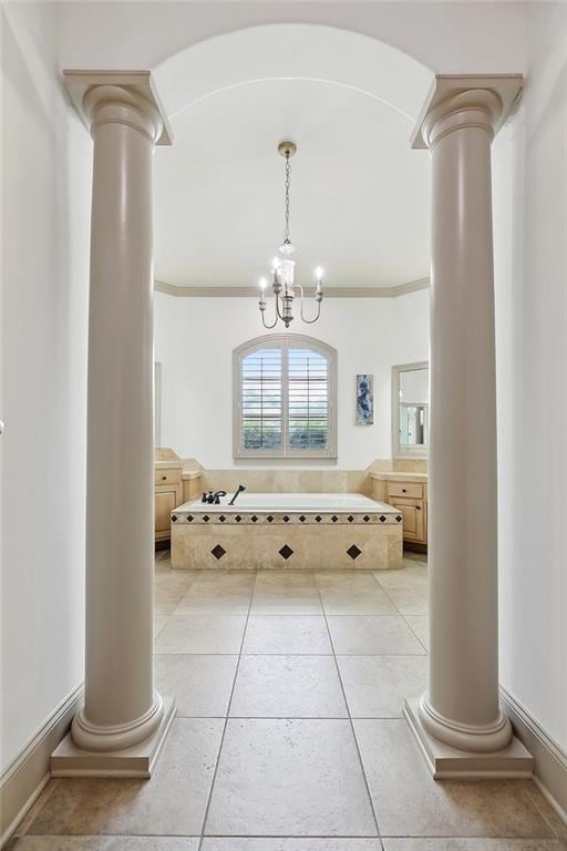126 Tchefuncta Dr S, Covington, LA 70433 - bathroom with ornate columns, vanity, a chandelier, a bath, and ornamental molding