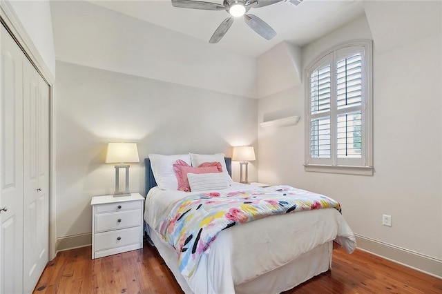 126 Tchefuncta Dr S, Covington, LA 70433 - bedroom with wood finished floors, a closet, baseboards, and ceiling fan