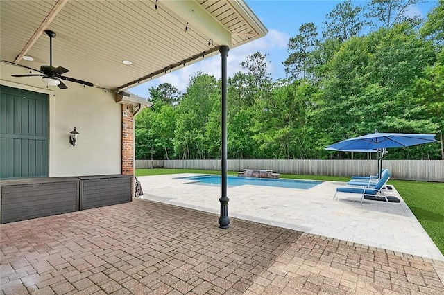126 Tchefuncta Dr S, Covington, LA 70433 - fenced backyard featuring a ceiling fan and a patio