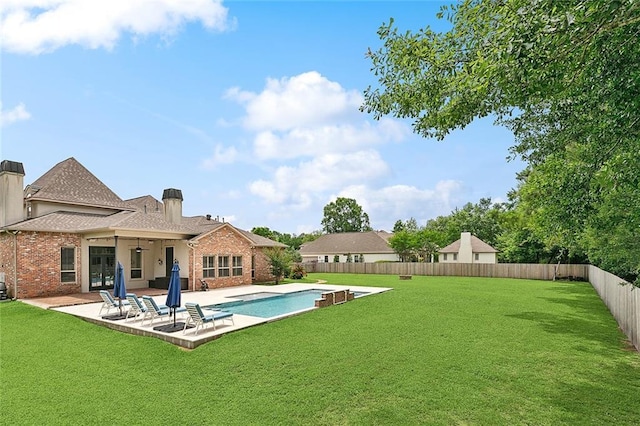126 Tchefuncta Dr S, Covington, LA 70433 - view of yard featuring french doors and a patio area