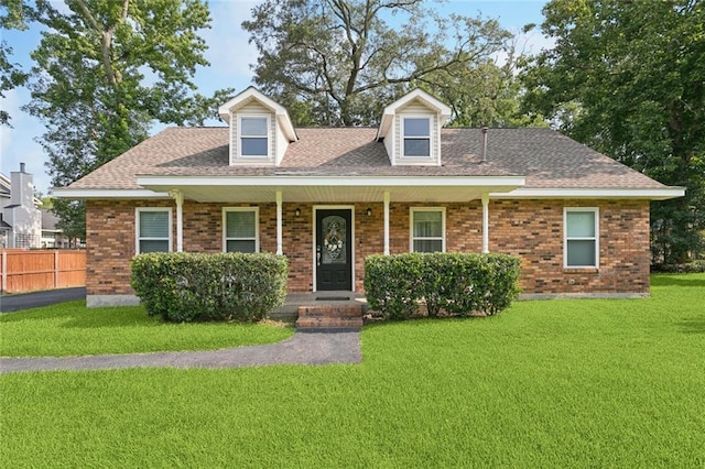 203 Willow Cir, Mandeville, LA 70471 - cape cod-style house featuring brick siding and a shingled roof