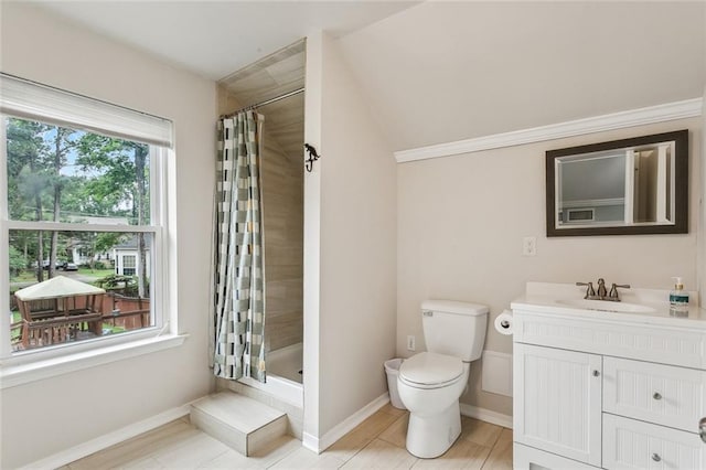 203 Willow Cir, Mandeville, LA 70471 - full bath with toilet, vanity, a tile shower, and baseboards