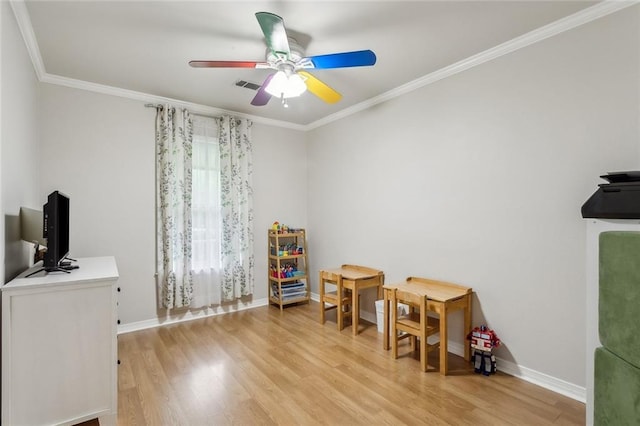 203 Willow Cir, Mandeville, LA 70471 - office area with crown molding, light wood finished floors, a ceiling fan, and baseboards