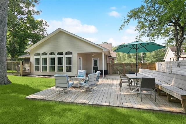 203 Willow Cir, Mandeville, LA 70471 - rear view of property featuring a deck and outdoor dining space