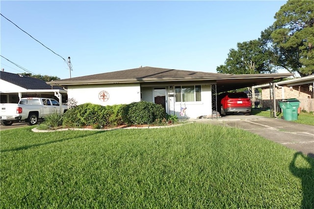 929 Carnation Ave, Metairie, LA 70001 - view of front of property with an attached carport, a front yard, and concrete driveway