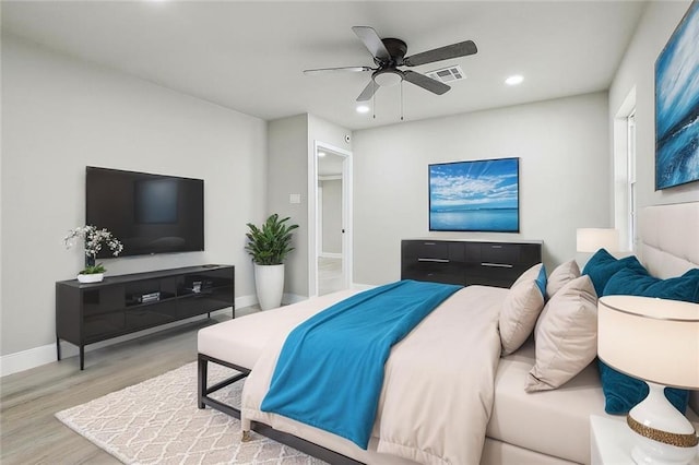 620 River Oaks Dr, New Orleans, LA 70131 - bedroom with wood finished floors, recessed lighting, ceiling fan, and baseboards