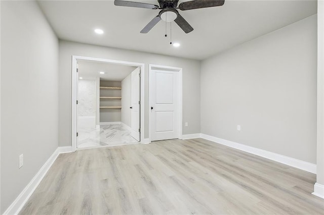 620 River Oaks Dr, New Orleans, LA 70131 - unfurnished bedroom with wood finished floors, recessed lighting, ensuite bath, and baseboards