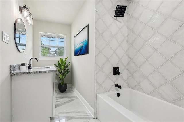 620 River Oaks Dr, New Orleans, LA 70131 - bathroom with marble finish floors, vanity, baseboards, and tub / shower combination