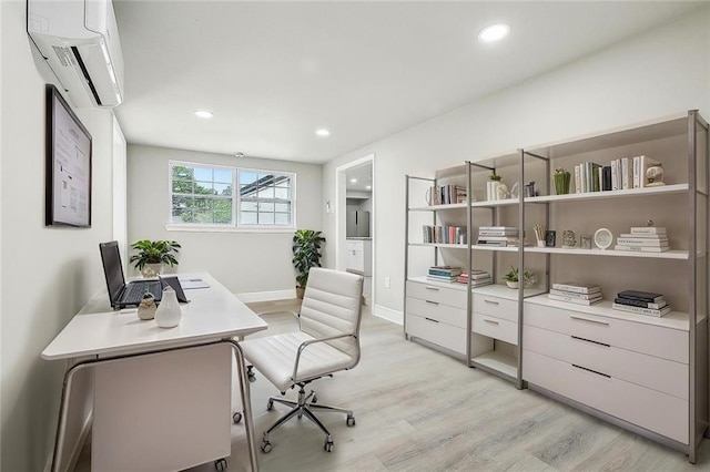 620 River Oaks Dr, New Orleans, LA 70131 - office space featuring an AC wall unit, light wood finished floors, recessed lighting, and baseboards
