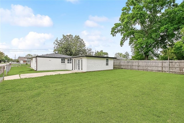 620 River Oaks Dr, New Orleans, LA 70131 - rear view of house with a patio