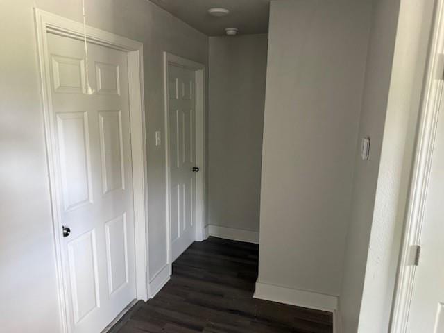 1479 Filmore Ave, New Orleans, LA 70122 - corridor with dark wood-type flooring and baseboards