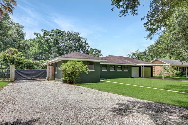 105 Norland Ave, New Orleans, LA 70131 - single story home with driveway and an attached garage