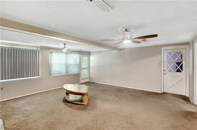 105 Norland Ave, New Orleans, LA 70131 - carpeted spare room with a ceiling fan and a textured ceiling