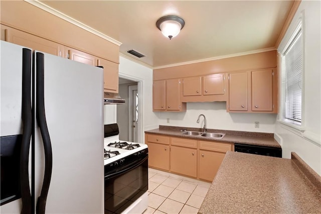 105 Norland Ave, New Orleans, LA 70131 - kitchen with freestanding refrigerator, white range with gas stovetop, under cabinet range hood, light tile patterned flooring, and dishwasher