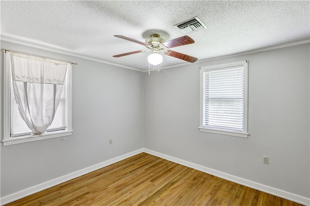 105 Norland Ave, New Orleans, LA 70131 - spare room with light wood-style floors, ceiling fan, a textured ceiling, and ornamental molding
