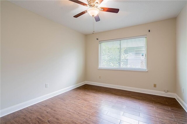 2924 Elizabeth St, Metairie, LA 70003 - empty room with ceiling fan, baseboards, and wood finished floors