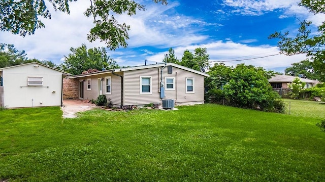 2924 Elizabeth St, Metairie, LA 70003 - back of property featuring central AC and an outdoor structure