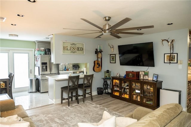 5121 Pike Dr, Metairie, LA 70003 - living room featuring a ceiling fan, light wood finished floors, and recessed lighting