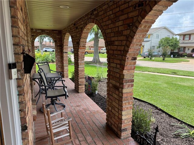 5121 Pike Dr, Metairie, LA 70003 - porch with a lawn