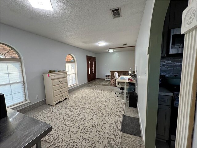 5121 Pike Dr, Metairie, LA 70003 - office featuring a textured ceiling and light carpet