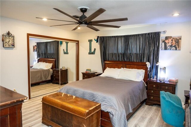 5121 Pike Dr, Metairie, LA 70003 - bedroom featuring light wood-type flooring, a closet, a ceiling fan, and recessed lighting