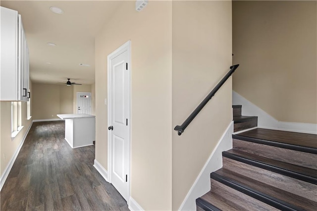 233234 S Liberty St, New Orleans, LA 70113 - stairway featuring wood finished floors, ceiling fan, baseboards, and recessed lighting