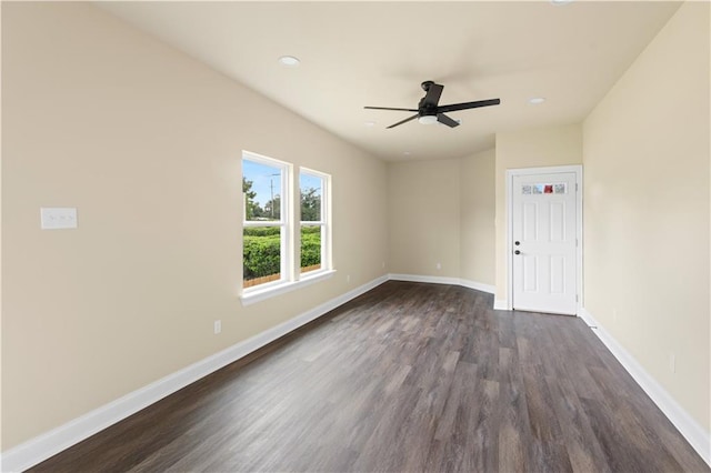 233234 S Liberty St, New Orleans, LA 70113 - empty room featuring dark wood-type flooring, ceiling fan, baseboards, and recessed lighting
