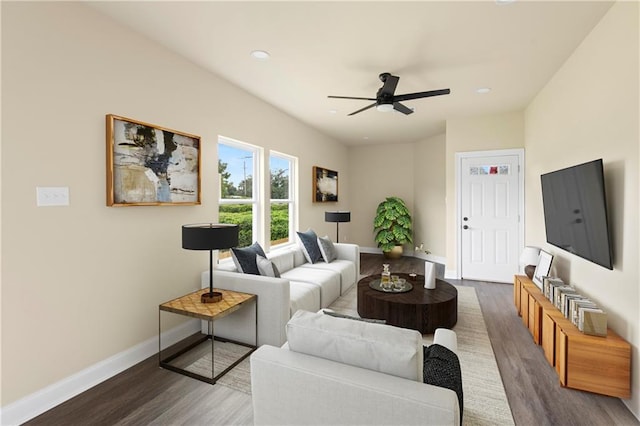 233234 S Liberty St, New Orleans, LA 70113 - living area with dark wood-type flooring, a ceiling fan, baseboards, and recessed lighting