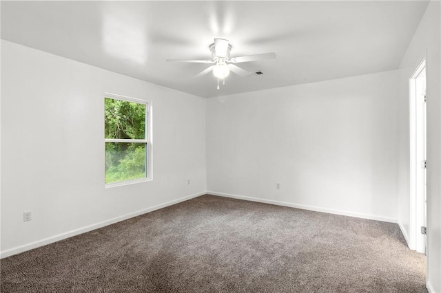305 S Walnut St, Hammond, LA 70403 - unfurnished room with carpet, ceiling fan, and baseboards