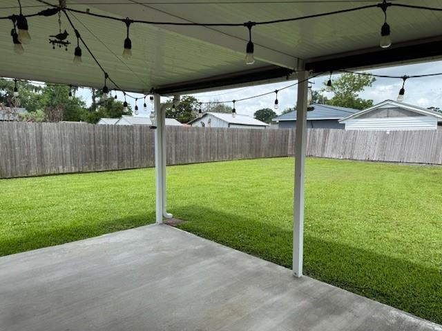 606 N Wilson St, Metairie, LA 70003 - view of yard featuring a patio