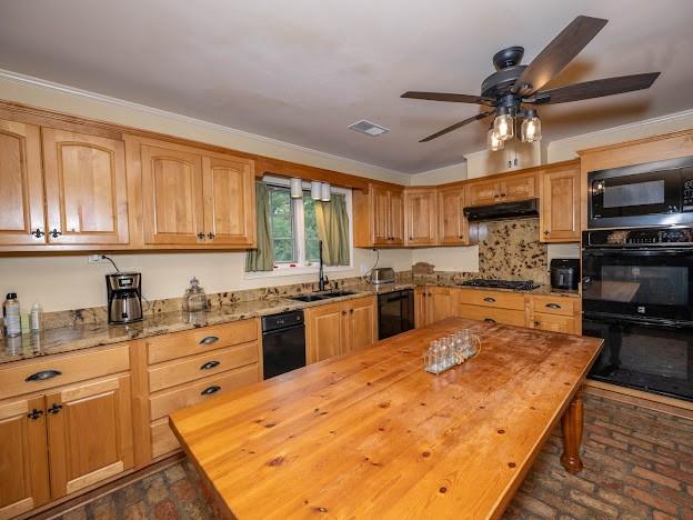 109 Kendrick Dr, Slidell, LA 70461 - kitchen with wood counters, black appliances, brick floors, a sink, and ventilation hood