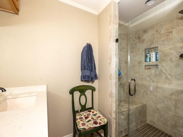 109 Kendrick Dr, Slidell, LA 70461 - bathroom with ornamental molding, a stall shower, vanity, and baseboards
