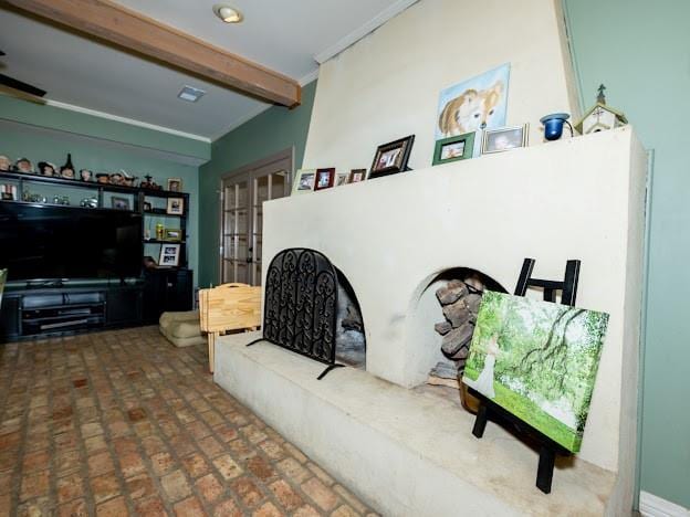 109 Kendrick Dr, Slidell, LA 70461 - living room featuring beam ceiling, brick flooring, french doors, and crown molding