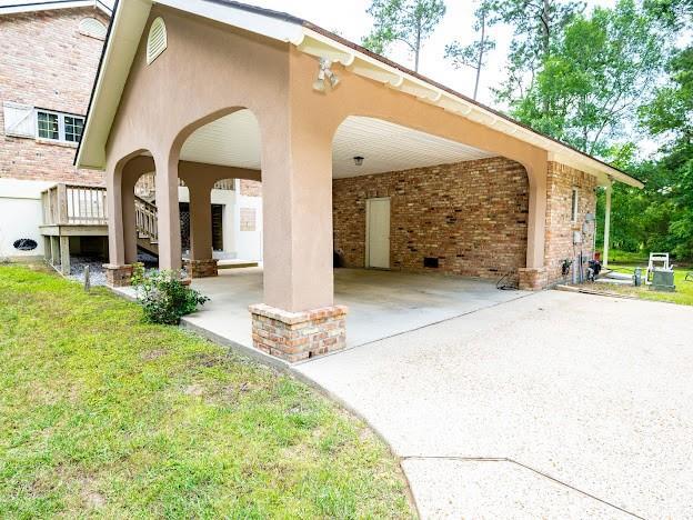 109 Kendrick Dr, Slidell, LA 70461 - view of patio / terrace with concrete driveway