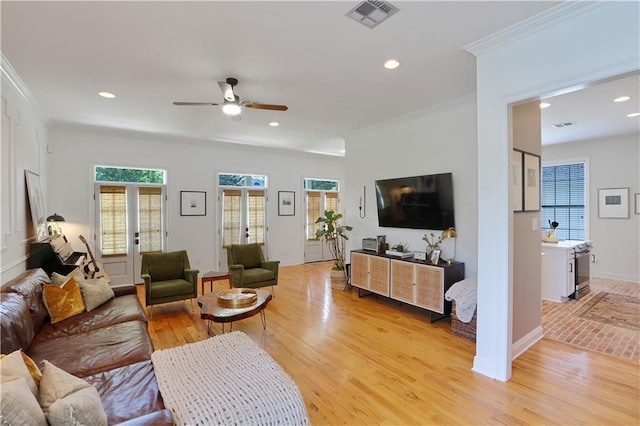 18123 Cusachs Dr, Covington, LA 70433 - living area with healthy amount of natural light, ornamental molding, a ceiling fan, recessed lighting, and baseboards