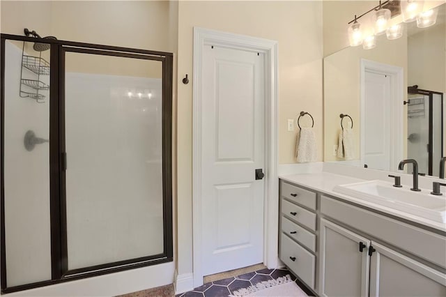 18123 Cusachs Dr, Covington, LA 70433 - bathroom with a stall shower, vanity, and tile patterned flooring