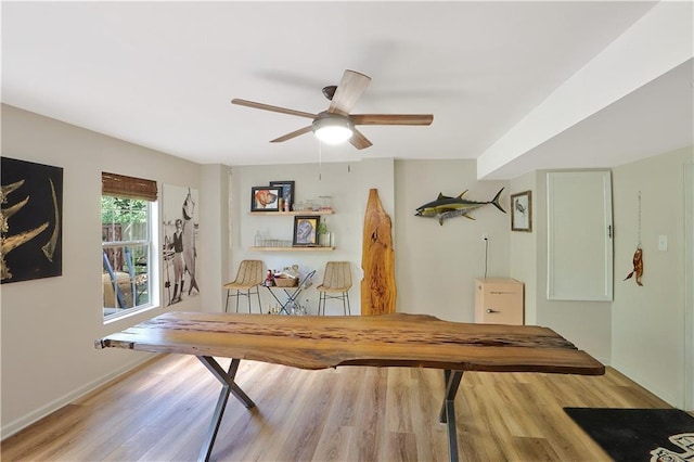 18123 Cusachs Dr, Covington, LA 70433 - dining room with wood finished floors, a ceiling fan, and baseboards