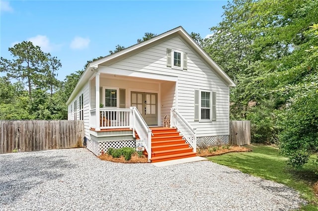 502 W 7th Ave, Covington, LA 70433 - bungalow-style house featuring a porch