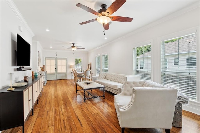 502 W 7th Ave, Covington, LA 70433 - living room with crown molding, french doors, light wood-style floors, a ceiling fan, and recessed lighting