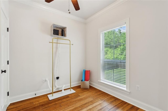 502 W 7th Ave, Covington, LA 70433 - empty room featuring ornamental molding, hardwood / wood-style flooring, baseboards, and ceiling fan